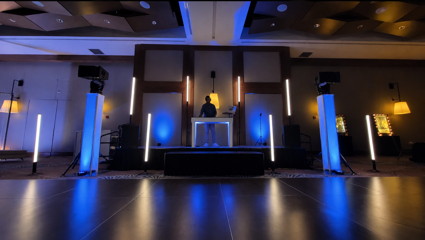 Wedding DJ stage with blue tube lighting
