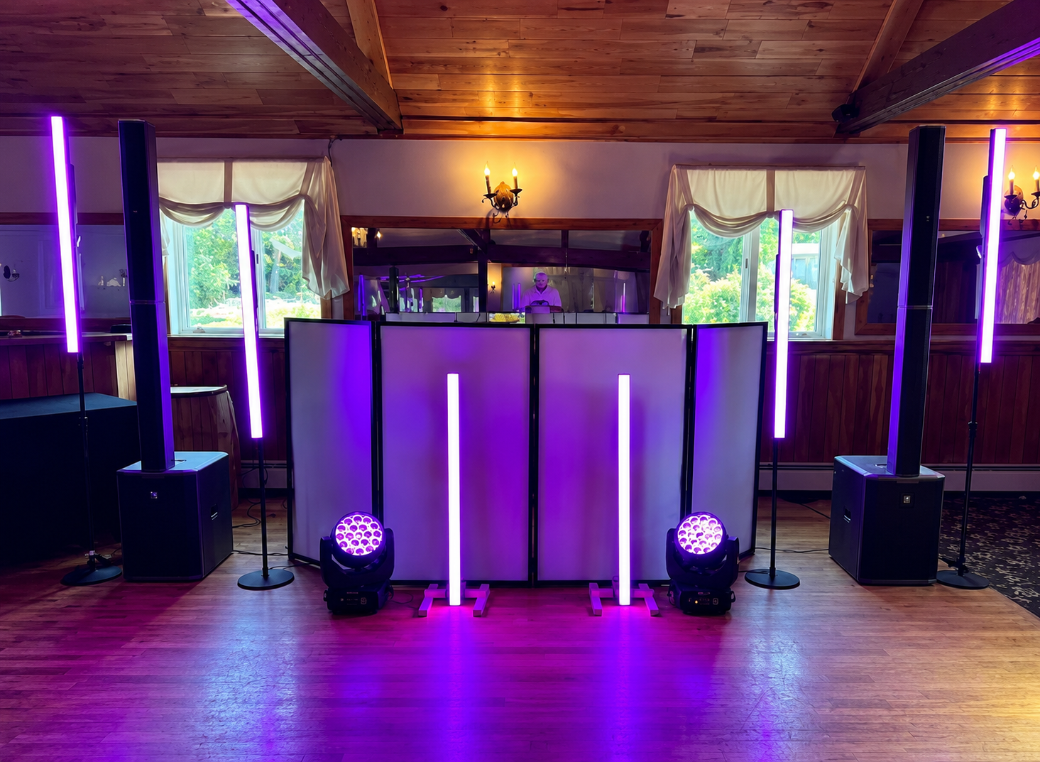 Wedding DJ setup with pink tube lights